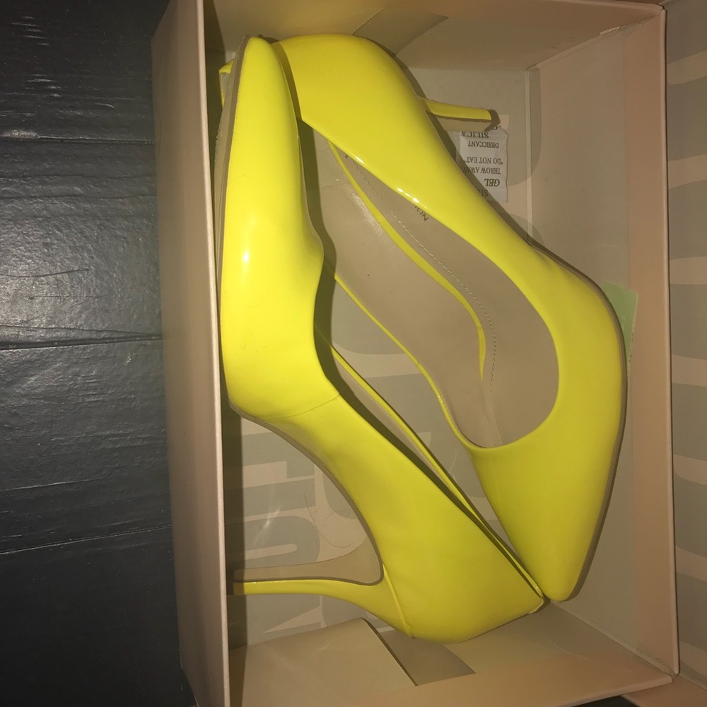 Neon yellow high heels